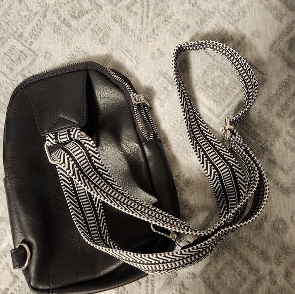 Purse, new cross body sling black and white adjustable strap. - Picture 3 of 5